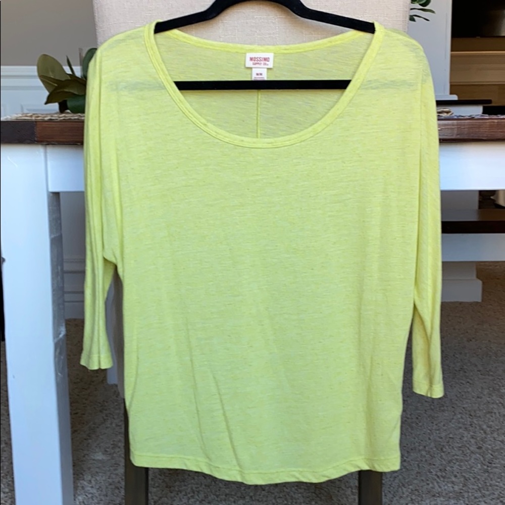 Light weight, three quarter sleeve knit shirt